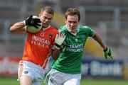 11 July 2010; Gareth Swift, Armagh, in action against James Sherry, Fermanagh. GAA Football All-Ireland Senior Championship Qualifier Round 2, Fermanagh v Armagh, Brewster Park, Enniskillen, Co. Fermanagh. Picture credit: Oliver McVeigh / SPORTSFILE