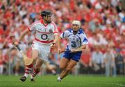 11 July 2010; Donal Óg Cusack, Cork, in action against Stephen Molumphy, Waterford. Munster GAA Hurling Senior Championship Final, Cork v Waterford, Semple Stadium, Thurles, Co. Tipperary. Picture credit: Barry Cregg / SPORTSFILE