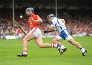 11 July 2010; Patrick Hogan, Cork, in action against Noel Connors, Waterford. Munster GAA Hurling Senior Championship Final, Cork v Waterford, Semple Stadium, Thurles, Co. Tipperary. Picture credit: Stephen McCarthy / SPORTSFILE