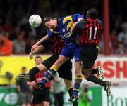 13 May 2001; Stephen Kelly, Longford Town in action against Mark Rutherford, 11, and Kevin Hunt, Bohemians. Longford Town v Bohemians, FAI Cup Final, Tolka Park, Dublin. Soccer. Picture credit; David Maher / SPORTSFILE