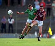 23 June 2001; Rory O'Connell, Westmeath, in action against Limerick's Jason Stokes. Limerick v Westmeath, Bank of Ireland All-Ireland Championship Qualifier, Gaelic Grounds, Limerick. Football. Picture credit; Brendan Moran / SPORTSFILE