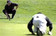 29 June 2001; Darren Clarke of Ireland lines up his putt on the 5th green with the help of his caddy during day two of the Murphy's Irish Open at Fota Island Golf Club in Cork. Photo by Brendan Moran/Sportsfile