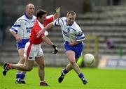 30 June 2001; Dermot McArdle, Monaghan, in action against Armagh's Barry O'Hagan. Monaghan v Armagh, Bank of Ireland Ulster Senior Football Championship Qualifier, St. Tighearnach's Park, Clones, Co. Monaghan. Picture credit; David Maher / SPORSTFILE *EDI*