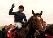 1 July 2001; Mick Kinane on Galileo waves to the crowd after winning The Budweiser Irish Derby at The Curragh, Co. Kildare. Horse Racing. Picture credit; Ray Lohan / SPORTSFILE