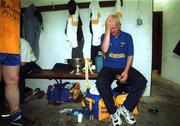 1 July 2001; Roscommon manager John Tobin holds his head in the dressing room following the Bank of Ireland Connacht Senior Football Championship Final match between Roscommon and Mayo at Dr. Hyde Park in Roscommon. Photo by David Maher/Sportsfile