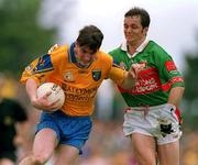 1 July 2001; Conor Connelly of Roscommon in action against Noel Connelly of Mayo during the Bank of Ireland Connacht Senior Football Championship Final match between Roscommon and Mayo at Dr. Hyde Park in Roscommon. Photo by David Maher/Sportsfile