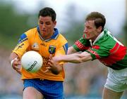 1 July 2001; Francie Grehan of Roscommon in action against James Nallen of Mayo during the Bank of Ireland Connacht Senior Football Championship Final match between Roscommon and Mayo at Dr. Hyde Park in Roscommon. Photo by David Maher/Sportsfile
