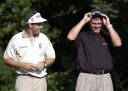 1 July 2001; Ireland's Padraig Harrington, left, and Darren Clarke share a joke after they finished joint second overall with Niclas Fasth and also finished joint leading Irishmen on day four of the Murphy's Irish Open at Fota Island Golf Club in Cork. Photo by Brendan Moran/Sportsfile