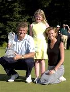 1 July 2001; Colin Montgomerie of Scotland celebrates with his wife Eimear and daughter Olivia and the trophy following day four of the Murphy's Irish Open at Fota Island Golf Club in Cork. Photo by Brendan Moran/Sportsfile