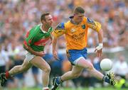 1 July 2001; Seamus O'Neill of Roscommon in action against Colm McManaman of Mayo during the Bank of Ireland Connacht Senior Football Championship Final match between Roscommon and Mayo at Dr. Hyde Park in Roscommon. Photo by David Maher/Sportsfile