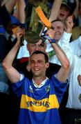 1 July 2001; Tipperary captain Thomas Dunne lifts the cup after the Guinness Munster Senior Hurling Final match between Tipperary and Limerick at Páirc Uí Chaoimh in Cork. Photo by Ray McManus/Sportsfile
