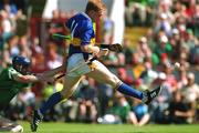 1 July 2001; Declan Ryan of Tipperary kicks the ball into the net to score Tipperary's second goal during the Guinness Munster Senior Hurling Final match between Tipperary and Limerick at Páirc Uí Chaoimh in Cork. Photo by Ray McManus/Sportsfile