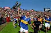 1 July 2001; Tipperary captain Thomas Dunne shows the cup to the Tipperary supporters following the Guinness Munster Senior Hurling Final match between Tipperary and Limerick at Páirc Uí Chaoimh in Cork. Photo by Damien Eagers/Sportsfile