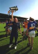 1 July 2001; John Leahy of Tipperary celebrates with his team-mates after the Guinness Munster Senior Hurling Final match between Tipperary and Limerick at Páirc Uí Chaoimh in Cork. Photo by Ray McManus/Sportsfile