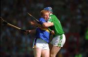 1 July 2001; Declan Ryan of Tipperary in action against Brian Geary of Limerick during the Guinness Munster Senior Hurling Final match between Tipperary and Limerick at Páirc Uí Chaoimh in Cork. Photo by Ray McManus/Sportsfile