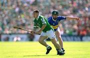 1 July 2001; Barry Foley of Limerick in action against David Kennedy of Tipperary during the Guinness Munster Senior Hurling Final match between Tipperary and Limerick at Páirc Uí Chaoimh in Cork. Photo by Damien Eagers/Sportsfile