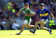 1 July 2001; Barry Foley of Limerick in action against Thomas Costello of Tipperary during the Guinness Munster Senior Hurling Final match between Tipperary and Limerick at Páirc Uí Chaoimh in Cork. Photo by Damien Eagers/Sportsfile
