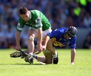 1 July 2001; Barry Foley of Limerick in action against Thomas Costello of Tipperary during the Guinness Munster Senior Hurling Final match between Tipperary and Limerick at Páirc Uí Chaoimh in Cork. Photo by Damien Eagers/Sportsfile