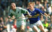 1 July 2001; Timmy Houlihan, Limerick goalkeeper, in action against Tipperary's Declan Ryan. Tipperary v Limerick, Guinness Munster Hurling Final, Pairc Ui Chaoimh, Co Cork. Picture credit; Ray McManus / SPORTSFILE