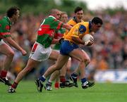 1 July 2001; Francie Grehan of Roscommon in action against James Nallen of Mayo during the Bank of Ireland Connacht Senior Football Championship Final match between Roscommon and Mayo at Dr. Hyde Park in Roscommon. Photo by David Maher/Sportsfile