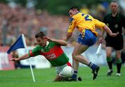 1 July 2001; Maurice Sheridan of Mayo in action against Denis Gavin of Roscommon during the Bank of Ireland Connacht Senior Football Championship Final match between Roscommon and Mayo at Dr. Hyde Park in Roscommon. Photo by David Maher/Sportsfile