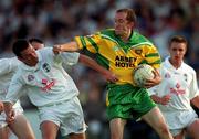30 June 2001; Eamon Doherty of Donegal in action against Padraig Brennan of Kildare during the Bank of Ireland All-Ireland Championship Qualifier match between Kildare and Donegal at St Conleths Park in Newbridge, Kildare. Photo by Damien Eagers/Sportsfile