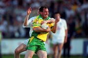 30 June 2001; Noel Ginley of Donegal in action against John Doyle of Kildare during the Bank of Ireland All-Ireland Championship Qualifier match between Kildare and Donegal at St Conleths Park in Newbridge, Kildare. Photo by Damien Eagers/Sportsfile