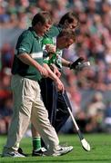 1 July 2001; Owen O'Neill of Limerick is helped from the field after receiving an injury during the Guinness Munster Senior Hurling Final match between Tipperary and Limerick at Páirc Uí Chaoimh in Cork. Photo by Ray McManus/Sportsfile