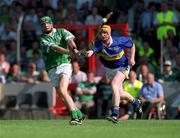 1 July 2001; Sean O'Connor of Limerick in action against Paul Ormonde of Tipperary during the Guinness Munster Senior Hurling Final match between Tipperary and Limerick at Páirc Uí Chaoimh in Cork. Photo by Ray McManus/Sportsfile