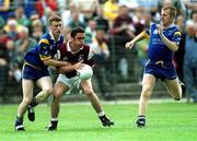 30 June 2001; Alan Kerins of Galway in action against Tom Burke, left, and Ronan Coffey of Wicklow during the Bank of Ireland All-Ireland Senior Football Championship Qualifier Round 2 match between Wicklow and Galway at Aughrim County Ground in Aughrim, Wicklow. Photo by Aoife Rice/Sportsfile
