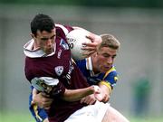 30 June 2001; Joe Bergin of Galway is tackled by Barry O'Donovan of Wicklow during the Bank of Ireland All-Ireland Senior Football Championship Qualifier Round 2 match between Wicklow and Galway at Aughrim County Ground in Aughrim, Wicklow. Photo by Aoife Rice/Sportsfile