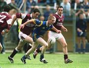 30 June 2001; Stevie Cush of Wicklow in action against Kieran Comer of Galway during the Bank of Ireland All-Ireland Senior Football Championship Qualifier Round 2 match between Wicklow and Galway at Aughrim County Ground in Aughrim, Wicklow. Photo by Ray McManus/Sportsfile