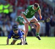 1 July 2001; Brian Begley of Limerick in action against Thomas Costello of Tipperary during the Guinness Munster Senior Hurling Final match between Tipperary and Limerick at Páirc Uí Chaoimh in Cork. Photo by Damien Eagers/Sportsfile