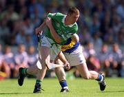 1 July 2001; Ciaran Carey of Limerick in action against Eugene O'Neill of Tipperary during the Guinness Munster Senior Hurling Final match between Tipperary and Limerick at Páirc Uí Chaoimh in Cork. Photo by Damien Eagers/Sportsfile