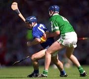 1 July 2001; Eoin Kelly of Tipperary in action against Brian Geary of Limerick during the Guinness Munster Senior Hurling Final match between Tipperary and Limerick at Páirc Uí Chaoimh in Cork. Photo by Ray McManus/Sportsfile