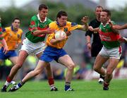 1 July 2001; Stephen Lohan of Roscommon in action against Maurice Sheridan of Mayo during the Bank of Ireland Connacht Senior Football Championship Final match between Roscommon and Mayo at Dr. Hyde Park in Roscommon. Photo by David Maher/Sportsfile
