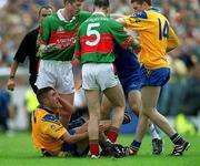 1 July 2001; Frankie Dolan of Roscommon holds his face after an incident with Ray Connelly of Mayo, after which the Mayo player was sent off, during the Bank of Ireland Connacht Senior Football Championship Final match between Roscommon and Mayo at Dr. Hyde Park in Roscommon. Photo by David Maher/Sportsfile