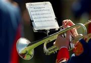 1 July 2001; A member of the Artane Boys Band plays the trumpet before the Guinness Munster Senior Hurling Final match between Tipperary and Limerick at Páirc Uí Chaoimh in Cork. Photo by Damien Eagers/Sportsfile