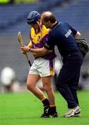 8 July 2001; Wexford's Colm Kehoe is attended to by the Wexford team doctor after receiving an injury. Kilkenny v Wexford, Leinster Senior Hurling Championship Final, Croke Park, Dublin. Hurling. Picture credit; Ray McManus / SPORTSFILE