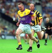 8 July 2001; Larry Murphy, Wexford, in action against Kilkenny's Andy Comerford. Kilkenny v Wexford, Leinster Senior Hurling Championship Final, Croke Park, Dublin. Picture credit; Pat Murphy / SPORTSFILE