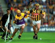 8 July 2001; Michael Jordan, Wexford, vies for possession with Kilkenny's Canice Brennan. Kilkenny v Wexford, Leinster Senior Hurling Championship Final, Croke Park, Dublin. Picture credit; Ray McManus / SPORTSFILE