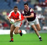 7 July 2001; Diarmuid Marsden, Armagh, in action against Galway's Sean O'Domhnaill. Galway v Armagh, All-Ireland Senior Football Championship Qualifier, Round 3, Croke Park, Dublin. Picture credit; Ray McManus / SPORTSFILE