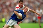 8 July 2001; Jason Reilly, Cavan, in action against Tyrone's Colin Holmes, Tyrone v Cavan. Bank of Ireland Ulster Football Final, St. Tighearnach's Park, Clones, Co. Monaghan. Picture credit; Damien Eagers / SPORTSFILE