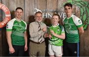 11 June 2016; Winner of the U14 Féile Peil na nÓg, Amelia Shaw from Killucan Ladies GAA Club, Co. Westmeath, being presented with her winners trophy by Finbar O'Driscoll, Leinster President of Ladies GAA, and John West ambassadors, Philly McMahon, left, and Danny Sutcliffe, at the John West Féile National Skills Star Challenge 2016, in the National Games Development Centre, Abbotstown, Dublin. Photo by Sportsfile