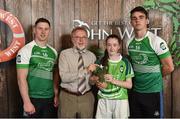 11 June 2016; 2nd place in the U14 Féile Peil na nÓg, Melissa O'Kane from St. Brigid's Gaels GAA Club, Co. Longford, being presented with her winners trophy by Finbar O'Driscoll, Leinster President of Ladies GAA, and John West ambassadors, Philly McMahon, left, and Danny Sutcliffe, at the John West Féile National Skills Star Challenge 2016, in the National Games Development Centre, Abbotstown, Dublin. Photo by Sportsfile