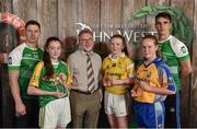 11 June 2016; Winner of the U14 Féile Peil na nÓg, Amelia Shaw from Killucan Ladies GAA Club, Co. Westmeath, 2nd place Melissa O'Kane, left, from St. Brigid's Gaels GAA Club, Co. Longford, and 3rd place Muireann Devaney from Glencar Manorhamilton GAA Club, Co. Leitrim, being presented with their winners trophies by Finbar O'Driscoll, Leinster President of Ladies GAA, and John West ambassadors, Philly McMahon, left, and Danny Sutcliffe, at the John West Féile National Skills Star Challenge 2016, in the National Games Development Centre, Abbotstown, Dublin. Photo by Sportsfile