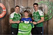 11 June 2016; U14 Féile Peil na nÓg participant Aaron Delahunty, from Co. Tipperary, being presented with a commemorative jersey by John West ambassadors, Philly McMahon, left, and Danny Sutcliffe, at the John West Féile National Skills Star Challenge 2016, at the National Games Development Centre, Abbotstown, Dublin. Photo by Sportsfile