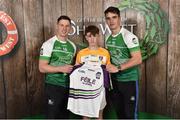 11 June 2016; U14 Féile na nGael participant Colla McDonnell, from Clooney Gaels GAA Club, Co. Antrim, being presented with a commemorative jersey by John West ambassadors, Philly McMahon, left, and Danny Sutcliffe, at the John West Féile National Skills Star Challenge 2016, at the National Games Development Centre, Abbotstown, Dublin. Photo by Sportsfile
