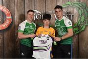 11 June 2016; U14 Féile na nGael participant Andrew Conheady from Tulla GAA Club, Co. Clare, being presented with a commemorative jersey by John West ambassadors, Philly McMahon, left, and Danny Sutcliffe, at the John West Féile National Skills Star Challenge 2016, at the National Games Development Centre, Abbotstown, Dublin. Photo by Sportsfile