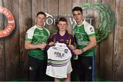 11 June 2016; U14 Féile na nGael participant Michael Rowsome from St. Patricks GAA Club, Co. Wexford, being presented with a commemorative jersey by John West ambassadors, Philly McMahon, left, and Danny Sutcliffe, at the John West Féile National Skills Star Challenge 2016, at the National Games Development Centre, Abbotstown, Dublin. Photo by Sportsfile